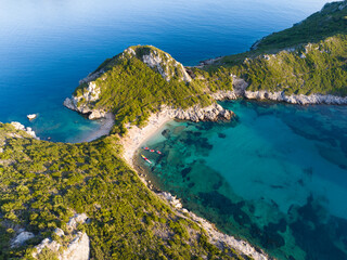 Aerial shot of Porto Timoni beach on Corfu Island, Greece. Beach and lagoon with turquoise water,...