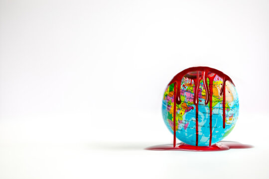 Global earth with dripping blood isolated on white background, broken world,Environmental Damage,industry,business economy, sickness copy space - Powered by Adobe