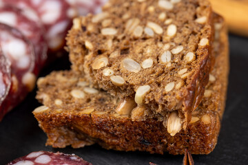 sliced black rye bread with sunflower seeds