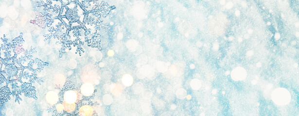 Christmas winter background, banner with copy space for text - view of decorative snowflakes on snow background, double exposure photo