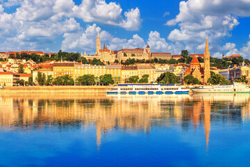 City summer landscape - view of the Buda Castle, palace complex on Castle Hill with Matthias Church over the Danube river in Budapest, Hungary