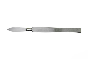 a surgical sharp metal scalpel is isolated on a white background.