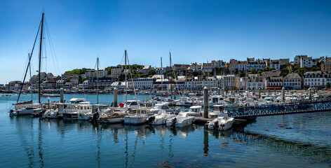 Fototapeta na wymiar Boats in The Harbor of City Audierne At The Finistere Atlantic Coast In Brittany, France