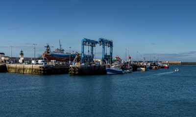 Fototapeta premium Harbor And Fishing Boats Of Finistere City Guilvinec At The Coast Of Atlantic In Brittany, France