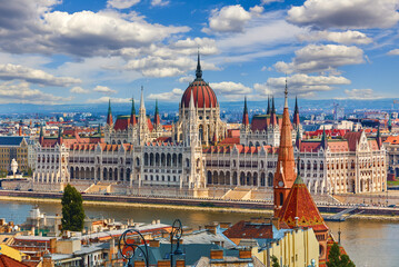 Fototapeta na wymiar Budapest city, Hungary. Sunset evening with building of Hungarian parliament at Danube river. Famous landmark and travel destination in Panoramic view