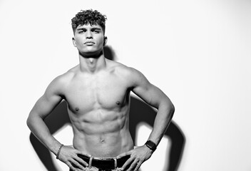 Fototapeta premium man trendy attractive jeans arm adult shirtless black and white muscle model torso sexy