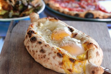 khachapuri - bread filled with cheese and eggs
