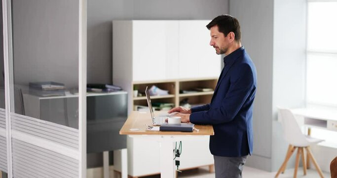 Adjustable Height Desk Stand In Office