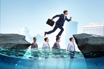 Inequal competition concept with businessman walking on heads