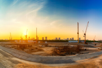 Fototapeta na wymiar Construction site in Dubai, United Arab Emirates, skyscrapers in the distance. Cranes on the site. Modern architecture. New world, new investments. Generative ai.