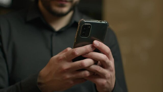 Close up male hands typing message texting sms chatting on smartphone screen unknown man businessman use phone mobile business apps shopping online browsing website social media make internet order