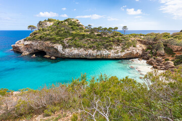 Mallorca beach: Caló des Moro, a small cove with crystal clear turquoise water, near the town of Santanyí. Concept of relaxation, summer and nature.