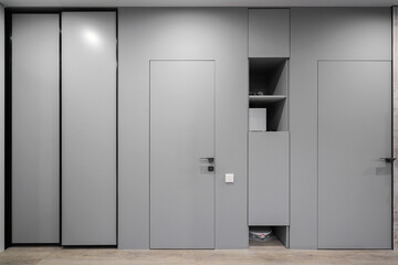Fototapeta premium Sliding wardrobe and interior door in the apartment