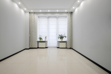 Windows in the empty new room in a apartment interior
