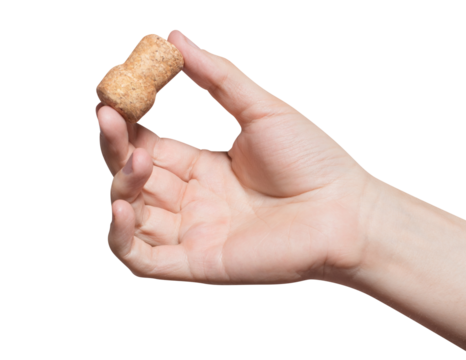 Hand holding a wine cork, cut out