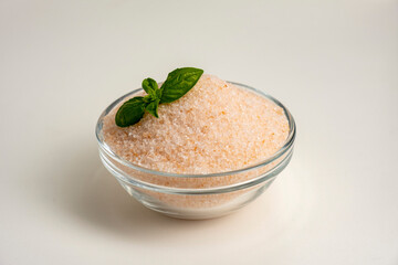 Himalayan salt in bowl on white background