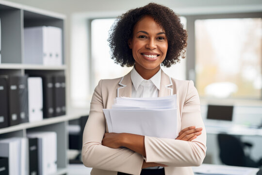 confident Human Resources Specialist in a modern office setting, with a smile on her face and a stack of resumes in her hand, generative ai