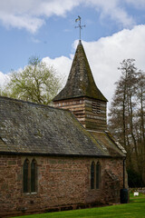 Fototapeta na wymiar Dewsall St Michael's Church, Herefordshire small church with spire