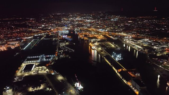Nightscape Aerial view of Ships Cranes Containers at Belfast Dockyard and Harbour Northern Ireland