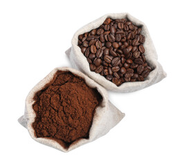 Bags with different types of coffee on white background, top view