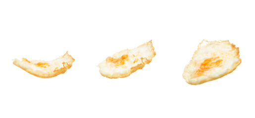 Fried Egg fly up from pan, fried egg float abstract and spin splash in air. Fried Egg is healthy ready food. White background Isolated high speed shutter, freeze stop motion photo