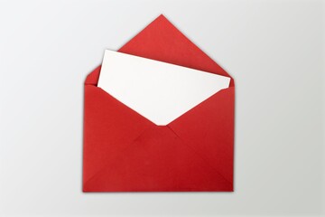 Blank white card  in colored envelope