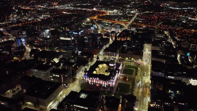 Nightscape Aerial footage of Belfast City Hall cityscape in Co Antrim Northern Ireland