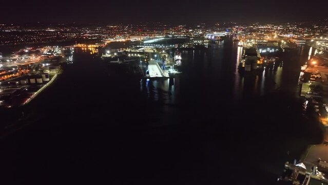 Nightscape Aerial view of Ships Cranes Containers at Belfast Dockyard and Harbour Northern Ireland