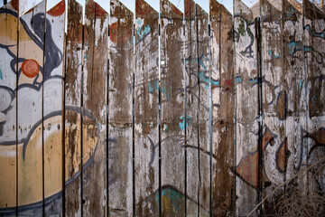 graffiti on wood fence
