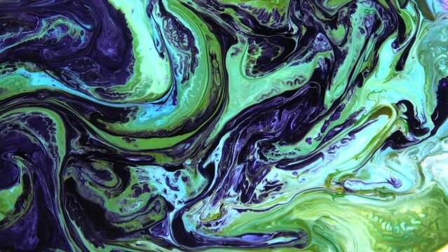 Liquid Colorful Paint Pattens Mix in Slow Motion. Liquid Color Paint Patterns Texture Top View. Multicolor Liquid Paint Surface.