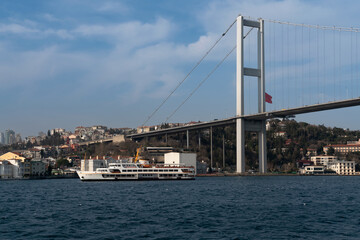 View of the suspension bridge between the European and Asian parts of Istanbul across the Bosphorus Strait Bridge July 15 Martyrs on a sunny day, Istanbul, Turkey