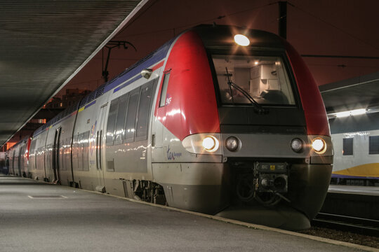 PARIS, FRANCE - JANUARY 1, 2008: EMU Regional train TER Bourgogne with the logo of SNCF French Railways on a platform of Paris Bercy Train station, heading towards Burgundy region