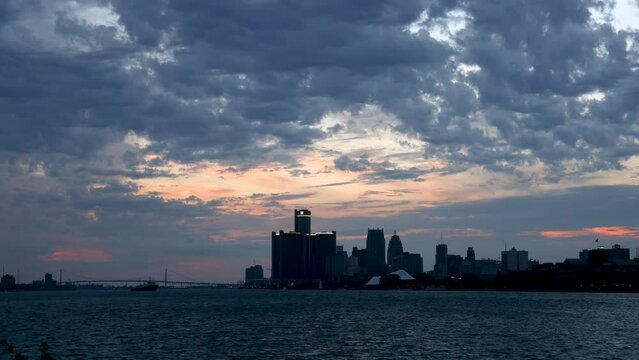 Downtown Detroit is the largest city in Michigan, population of 639,111 as per 2020 census. Time lapse video of dramatic clouds over city.