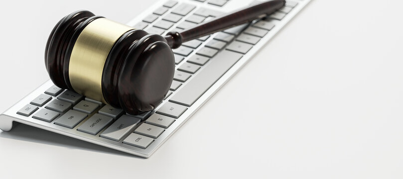 Digital Law Legal System Justice Crime concept. Mallet Gavel on keyboard. 3d render