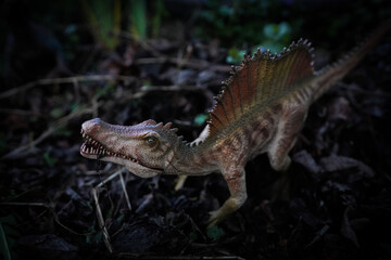 Spinosaurus prehistoric carnivore dinosaur toy with focus on the face