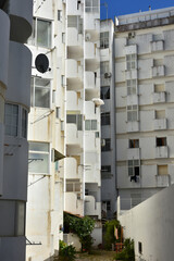 Low angle view of modern condo building in Armacao de Pera