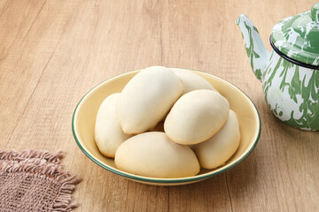 Nopia or Ndog Gluduk, Indonesian traditional snack, made from flour dough filled with brown sugar and baked
