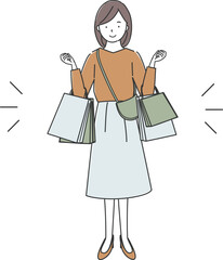 両手にショッピングバッグを持つ女性