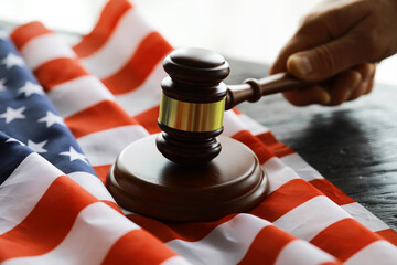 Judge's gavel on the table in focus. Cropped view of Judge's hammer for attention and verdict,...