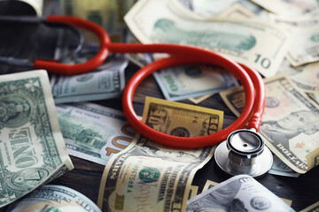 Financial analysis, auditing or business concept. Symbolic image of US Dollar banknotes with...