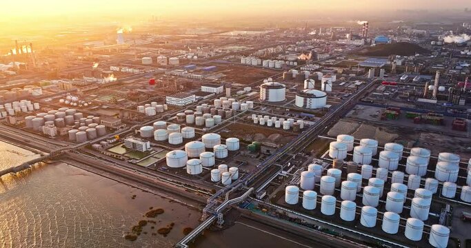 Aerial view oil terminal storage tank, White oil tank storage chemical petroleum petrochemical refinery product at oil terminal.