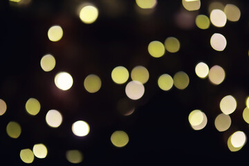 Abstract bokeh background. Golden bokeh circles on dark blue background. Layer overlay.