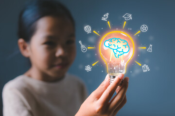 Girl holding light bulb with virtual education graduate icon. E-learning education, smart learning online with brainstorm, study knowledge, creative thinking idea concept.