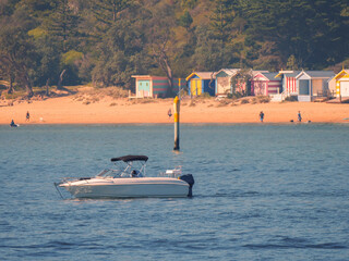 Cruiser In Front Of Beach Huts