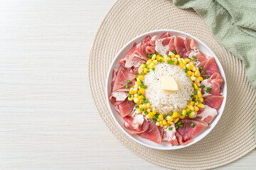 fresh pork raw sliced with rice and corn on plate and ready to cook