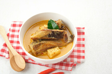 Mangut, made from smoked stingray fish cooked with spices and coconut milk. Indonesian traditional food.

