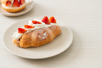 strawberry fresh cream croissant on plate