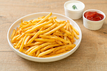French fries with sour cream and ketchup
