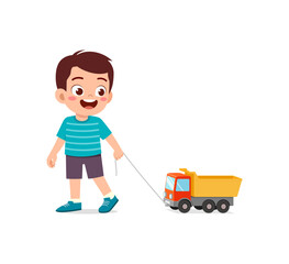little kid playing a toy truck and feel happy