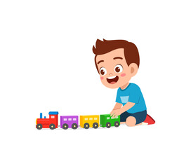little kid playing toy train made from plastic and feel happy